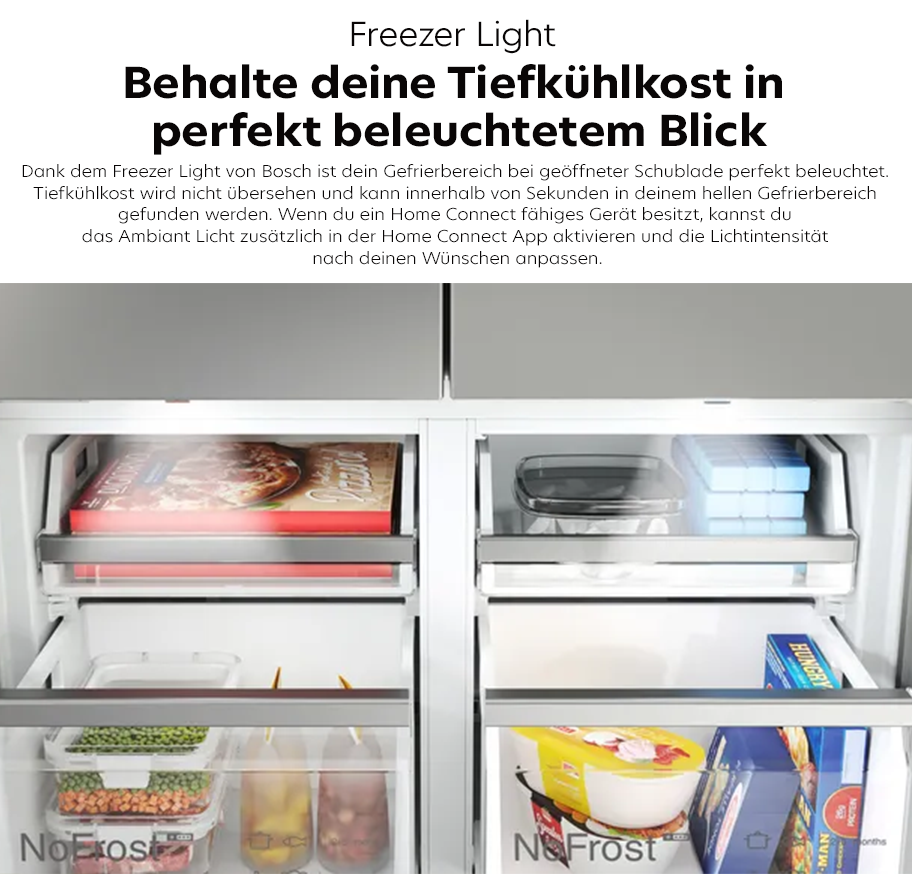 Feature-Banner,Geöffneter Gefrierschrank mit Bosch Freezer Light, das den Innenraum hell beleuchtet und Tiefkühlkost sichtbar macht